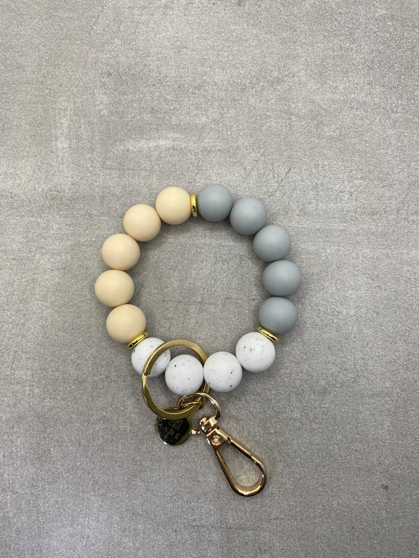 CREME BLISS – SCHLÜSSELANHÄNGER-ARMBAND